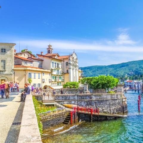 a group of people walking on a bridge