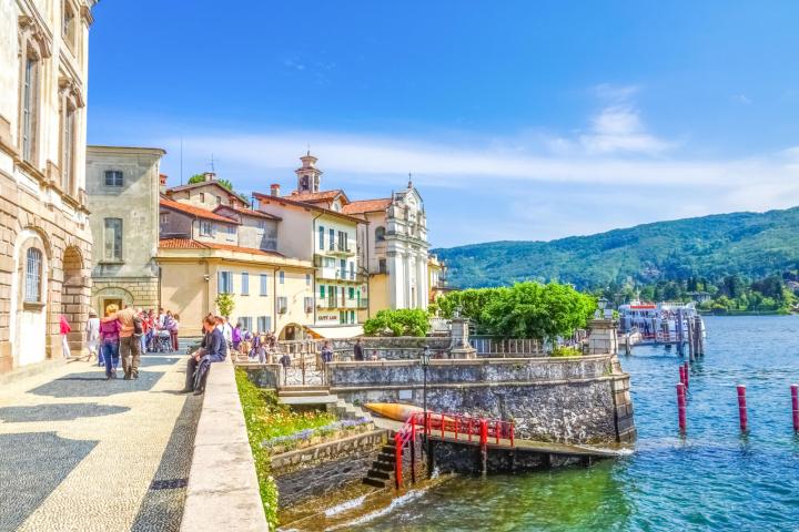 a group of people walking on a bridge