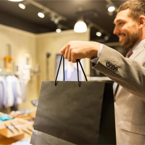 Jamie Noble standing in a room