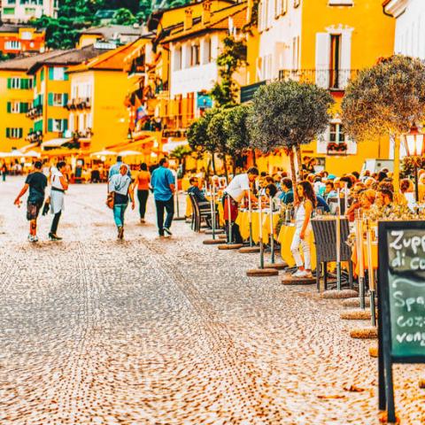 a group of people walking down the street
