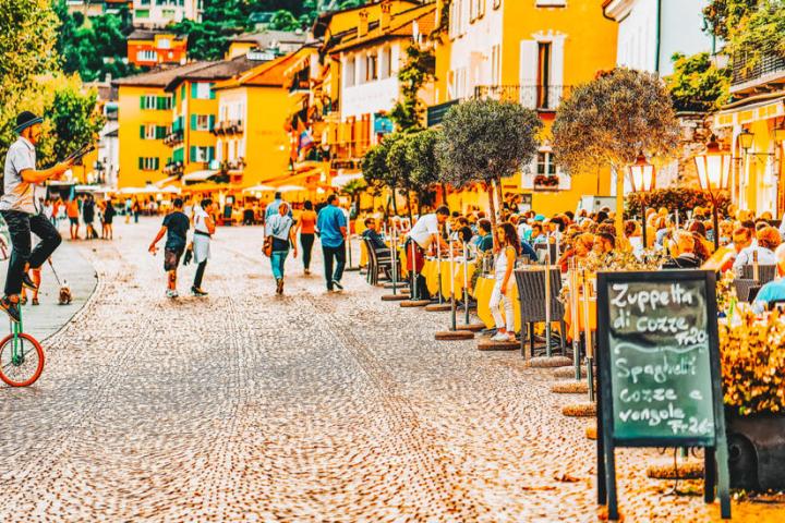a group of people walking down the street