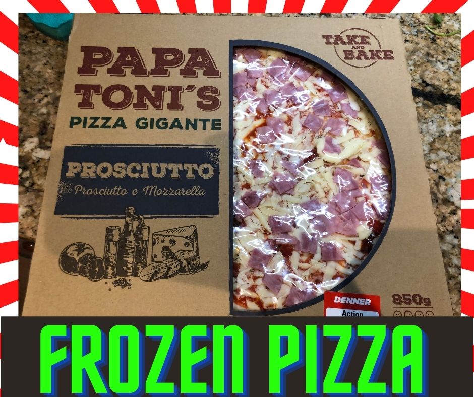 a pizza sitting on top of a sign